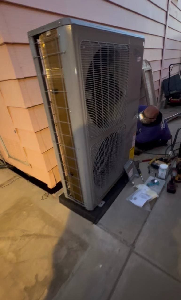 A Good Hope technician servicing a heating system